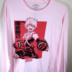 a pink long sleeve shirt with an anime character on it