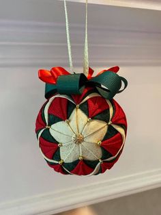 a christmas ornament hanging from the ceiling