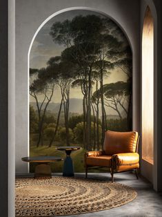 an arch in a room with a painting on the wall and a chair next to it