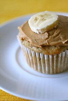 a banana and peanut butter cupcake on a plate