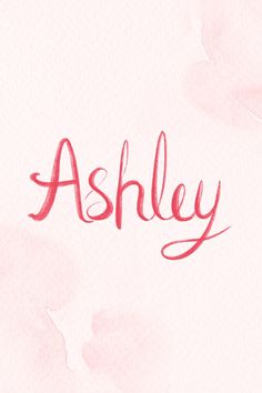 the word ashley written in red ink on a light pink background with watercolor stains