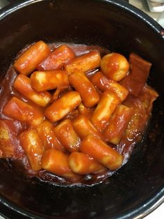 the food is being cooked in the pot on the stove top, ready to be eaten