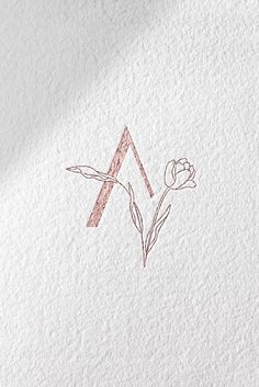 the logo for a flower shop is shown on a white paper with pink and brown ink