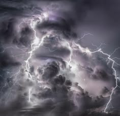 a large cloud filled with lots of lightning