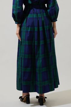 We are getting all the cute fall vibes with the Harrisville Plaid A-Line Maxi Skirt. Features a flattering high waist with pleats all along the front and back. Pockets on each side. Wear it with any boots for a chic ensemble.- Plaid- A-line- Pocket- Maxi- Color: Navy GreenSize + Fit - Model is 10" and wearing size XS- Measurements taken from size S - Waist: 13 1/4"- Length: 40" Fabric Self: 100% Cotton, Lining: 97% Polyester 3% Spandex Style Number STS7087P Flowy Maxi Skirts, Kimono Sweater, Tiered Maxi Skirt, Curvy Dress, Navy Green, Navy And Green, Fall Vibes, Kids Dress, A Line Skirts