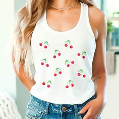 A cute spring summer season women's racerback tank top featuring a cherries design. A great gift for foodies, plant lovers and gardeners!  Free shipping on orders over $35 USD! Sizing: These are soft and comfy racerback tank tops. They are slim fit and light fabric which is nice and cool for summer. Care Instructions: Our tank tops are happy to be machine washed at (max 30C or 90F); Do not bleach. Tumble dry on a low heat. Do not iron. Do not dryclean. Production Time: Items are made to order, and production time is between 2-5 days. Delivery Time: Printed and shipped from the USA. Delivery time for the US is between 2-7 days. Refunds: Should you wish to return your item for a full refund please return the item in its original state within 30 days. Buyer pays return postage. Please send me Fruit Tank Top, Cottage Core Clothes, Core Clothes, Cool For Summer, Coquette Clothing, Summer Care, Womens Tank Tops, Cherry Print, Cute Spring