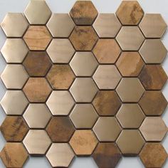 a wall made up of wooden hexagonal tiles