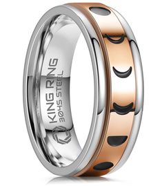 two tone gold and silver wedding band with black dots on the inside, set in an 18k rose gold plated ring