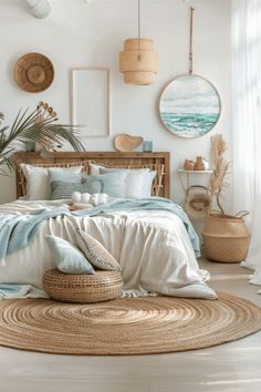 a bed with blue and white sheets in a room next to a rug on the floor