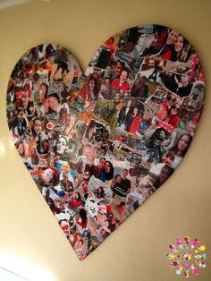 a heart shaped photo collage on the wall