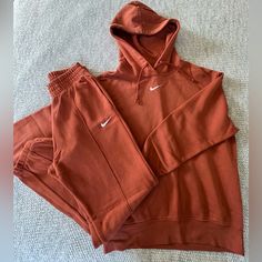 Nike Matching Set. Hoodie And Jogger Pants.Great Used Condition. Has Few Small Pullings Barely Noticeable, On Pants (See All Photos Please) Other Than That No Flaws Noticed. Color Is More Like Terracotta. Reasonable Offers Are Welcome! Nike Matching Set Outfit, Sweatsuits For Women, Matching Set Outfit, Nike Sweatsuit, Nike Jogger, Matching Fits, Nike Brown, Set Outfit, Nike Pants