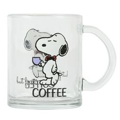 a glass coffee mug with a cartoon character on it