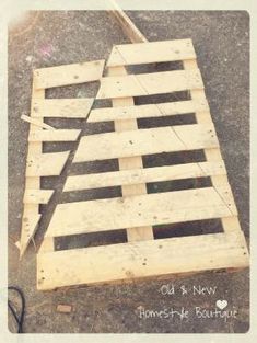 a wooden pallet sitting on the ground