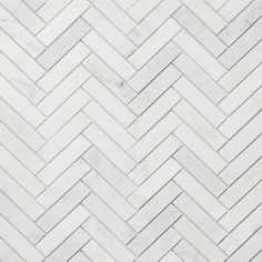 a white marble herringle tile pattern