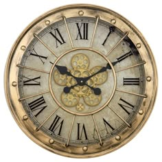 an old clock with roman numerals on the face is shown in gold and black