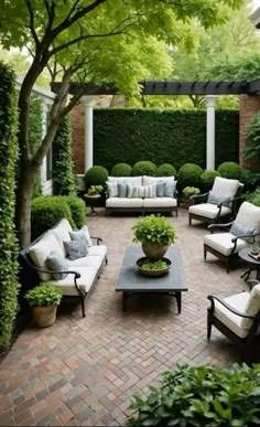 an outdoor living area with couches, chairs and tables in the middle of it