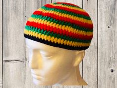 Reggae hat Mens Knitted Crochet Beanie Fisherman style. Trendy short Striped skull cap.  Handmade clothes in a Multicoloured Jamaican Retro style. Hippie Fashion .... Suitable for party, Carnival or festival. Every day casual wear.                Sizes available :- (Approx and Average) Small: Circumference 19" / Height 5.5" Medium : Circumference 20"/ height 5.5" Large : Circumference 21"/ height 6" Ex Large : Circumference 22" / Height 6.25" This hat height is designed to sit above the ears ... Crochet Bob Marley Hat, Multicolor Crochet Festival Cap, Rasta Crochet, Reggae Crochet Top, Rasta Beanie, Crochet Skull, Cap Mens, Mode Hippie, Bonnet Crochet