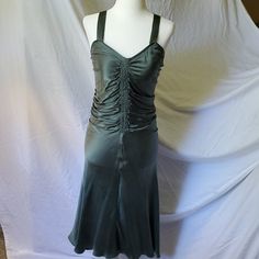 This Boutique Dress Is 100% Silk And Is Effortlessly Elegant, Can Easily Be Dressed Up Or Down. The Front Gathering Has Elastic And Stretches To Fit Nicely Through The Bodice. The Back Has A Hidden Zipper, Gathered Silk And Cross Cross Straps. The Fabric Is A Suede Silk And Is Cut On The Bias Which Gives It A Beautiful Drape And The Nice Flowing Hemline. I Would Call This Color Dark Sage Or Slightly Bluish Version Of An Army Green. This Dress Has Never Been Worn And Is New With Tags Still On It. Fish Dress, Doll Brooch, Sleeveless Denim Dress, Jessica Howard Dress, Dark Sage, Tadashi Shoji Dresses, Ruffle Trim Dress, Dress Cottagecore, Vince Camuto Dress