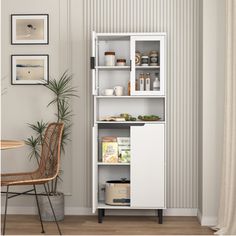 a tall white cabinet with shelves filled with food