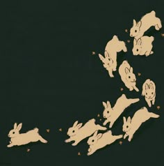 an image of rabbits flying in the air with stars around them on a black background