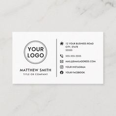 a white business card with a black circle logo on the front and bottom, which reads your