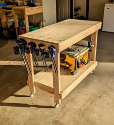 a workbench with tools on it in a garage