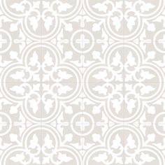 a white tile pattern with circles and crosses