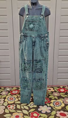 Cute pair of Vintage 80's 90's dark green denim overalls.  They have great factory made distressed areas with frayed edges. Frayed hole on the lower right leg  .   Label: Kansas.     They have adjustable shoulder straps and  a zipper  fly.   Measurements are taken with item laying flat so widths across must be doubled  Vintage size tag says size Large please see below.  Length = 56   in   in (measured without the straps, from the top of waist down to leg hems) Across the Waist = 19.5  in Across Green Overalls, Womens Overalls, Overalls Women, Denim Overalls, Vintage Denim, Size Tag, Shoulder Straps, Dark Green, Overalls