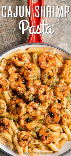 cajun shrimp pasta in a skillet with the title above it