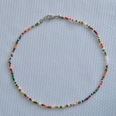 -perfect fall layering necklace -13”-“15.5” -glass seed beads Trendy Beaded Jewelry Fall, Fall Bead Necklaces, Multicolor Single Strand Choker, Orange Choker With Colorful Beads, Beaded Choker With Spacer Beads, Dainty Colorful Beaded Choker Necklace, Colorful Heishi Beads Choker Necklace, Heishi Beads Choker With Tiny Beads, Dainty Multicolor Beaded Choker Necklace