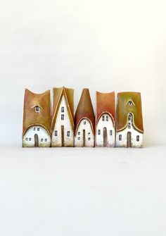 five small houses are lined up in a row