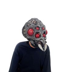 This supersized arachnoid alien mask has alien eyes and fangs for great scare factor, The mask is constructed with a foam insert for height and comfort and bone like spider-like features! This spider mask has a great alien look but also resembles a spider face in a full overhead latex mask. This mask utilizes a foam insert to help keep the wearer comfortable and prevent the mask from shifting on the wearer's head. Hand-poured, painted, and assembled in the USA. This Halloween mask can be used co Spooky Mask For Cosplay, Futuristic Full Face Mask For Halloween, Horror Skull Mask For Cosplay, Sci-fi Black Masks And Prosthetics For Halloween, Futuristic Masks And Prosthetics For Halloween Masquerade, Futuristic Masks And Prosthetics For Halloween, Futuristic Masks And Prosthetics For Halloween Costume Party, Futuristic Halloween Costume Masks And Prosthetics, Monster Spider