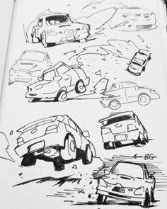 an open notebook with drawings of cars on it