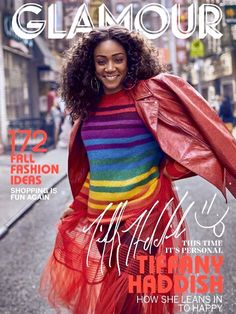 the cover of glamour magazine featuring an image of a woman in a colorful dress and leather jacket