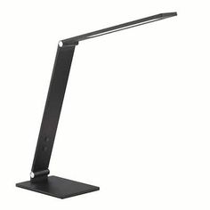 a black desk lamp on a white background