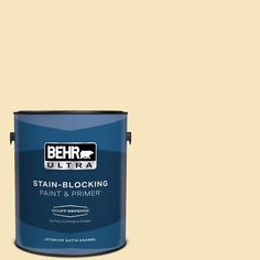 the behr ultra stain blocking paint and primer is shown in light beige, with black