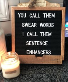 a sign that says you call them swear words i call them sentence enhancers