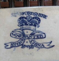 graffiti on the side of a building that says, st pudskin's warrant stone china