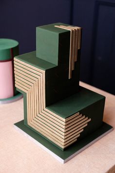 a stack of folded paper sitting on top of a table