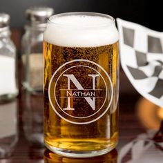 a close up of a beer glass on a table