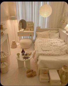 a bedroom with white furniture and accessories in it's centerpieces, including a bed