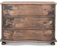 an old wooden chest of drawers with peeling paint on the top and bottom, against a white background