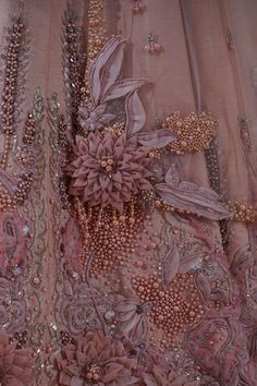 Peach sleeveless glass neck padded blouse with 3D garden bloom embroidery using misty pearls, sequins, beads embellishments. Paired with an attached cancan kalidaar lehenga with 3D gardenia bloom pearl, sequins, beads heavy embroidery on the border and clover pearl drops embellishments all over, floral hand embroidered belt and a pearl embellished border tulle dupatta. - Aza Fashions Bloom Embroidery, Embroidered Belt, Padded Blouse, On The Border, Heavy Embroidery, Bridal Lehengas, Mesh Skirt, Silk Embroidery, Family Pics