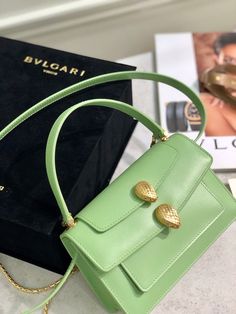 Size: 18.5cm*13cm*6.5cm It comes with Dust box, Care manual, Tag, and Paper bag. High-end Box Bag With Handles As Gift, High-end Bags As A Gift, High-end Top Handle Bag As Gift, High-end Green Box Bag With Top Carry Handle, High-end Green Box Bag For Shopping, Luxury Green Handheld Box Bag, Designer Top Handle Satchel As Gift, Designer Handheld Bag As Gift, Designer Handheld Bag As A Gift