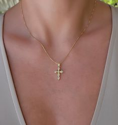 "Crystal decor cross pendant necklace. Wear it on it's own or layer it.  Pendant details:  * Material: non tarnish gold filled, cubic zircon * Measurements: 0.9'H 0.6'W Chain: non tarnish gold filled Comes in our gift ready packaging: vegan leather pouch for safe jewelry storing and branded box  GOLD FILLED Tarnish Resistant. Hypoallergenic. Long Lasting. Gold filled is affordable alternative to solid gold. Hypoallergenic - sensitive skin friendly. With proper care it will last for years. What i Cheap Cross Necklace With Clavicle Chain, Cheap Yellow Gold Cross Pendant Jewelry, Rustic Gold Cross Necklace, Simple Cross Necklace Gold, Cross Necklace Simple, Tiny Cross Necklace, Pendant Minimalist, Tiny Cross, Jewelry Words