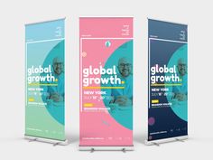 three roll up banners with the words global growth on them