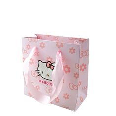 a hello kitty shopping bag with pink bows