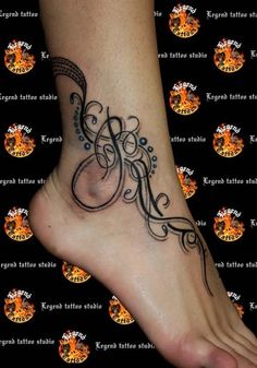 a person with a tattoo on their foot