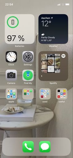 an iphone with the home screen showing different icons and numbers on it's display