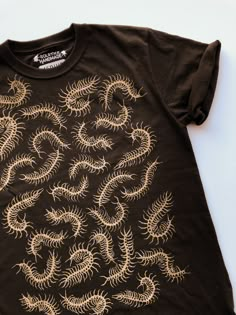 a t - shirt that has some kind of design on it